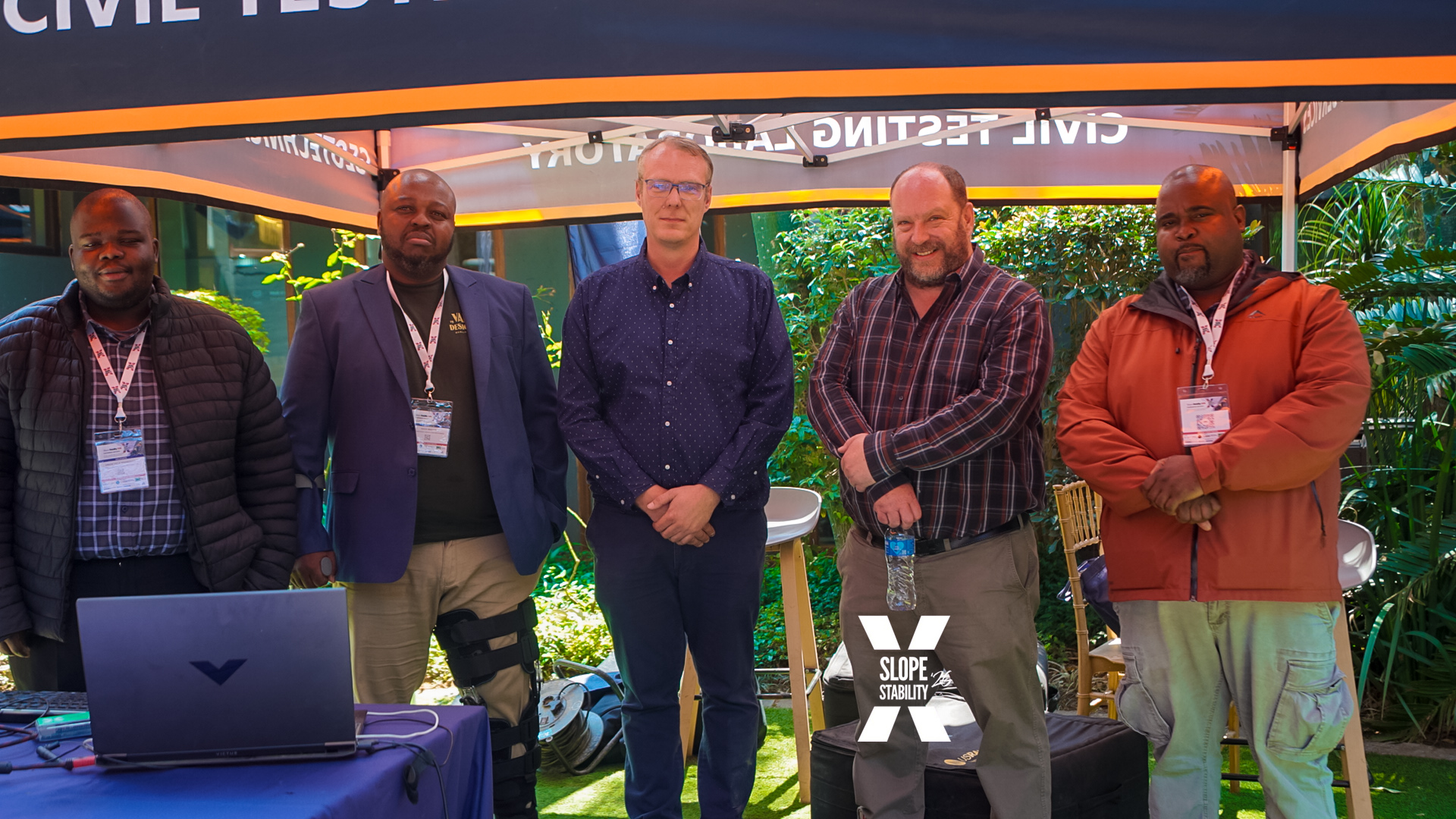Exhibitors at the outdoor civil testing laboratory stand