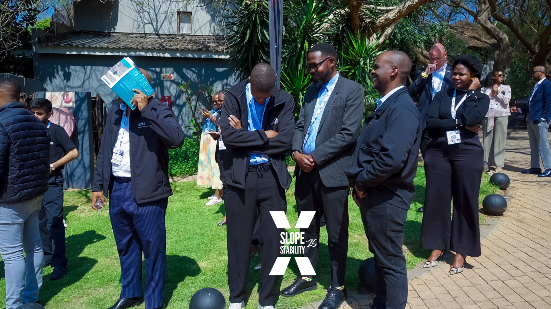 Delegates at an outdoor demonstration at SSX26