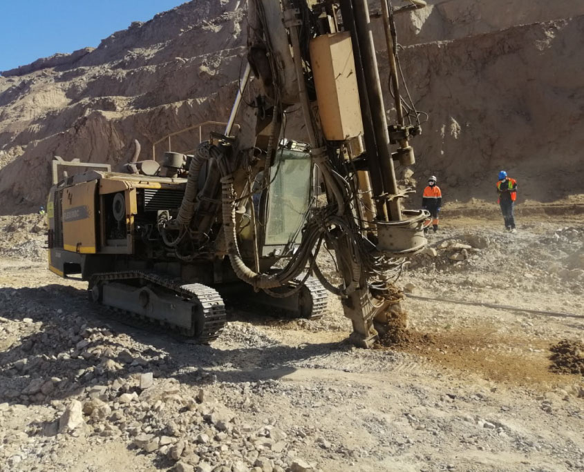 Geotechnical team monitoring a pit wall at Swakop